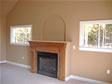RBA Homes offers many different style fireplaces with wood surround to customize a modular home